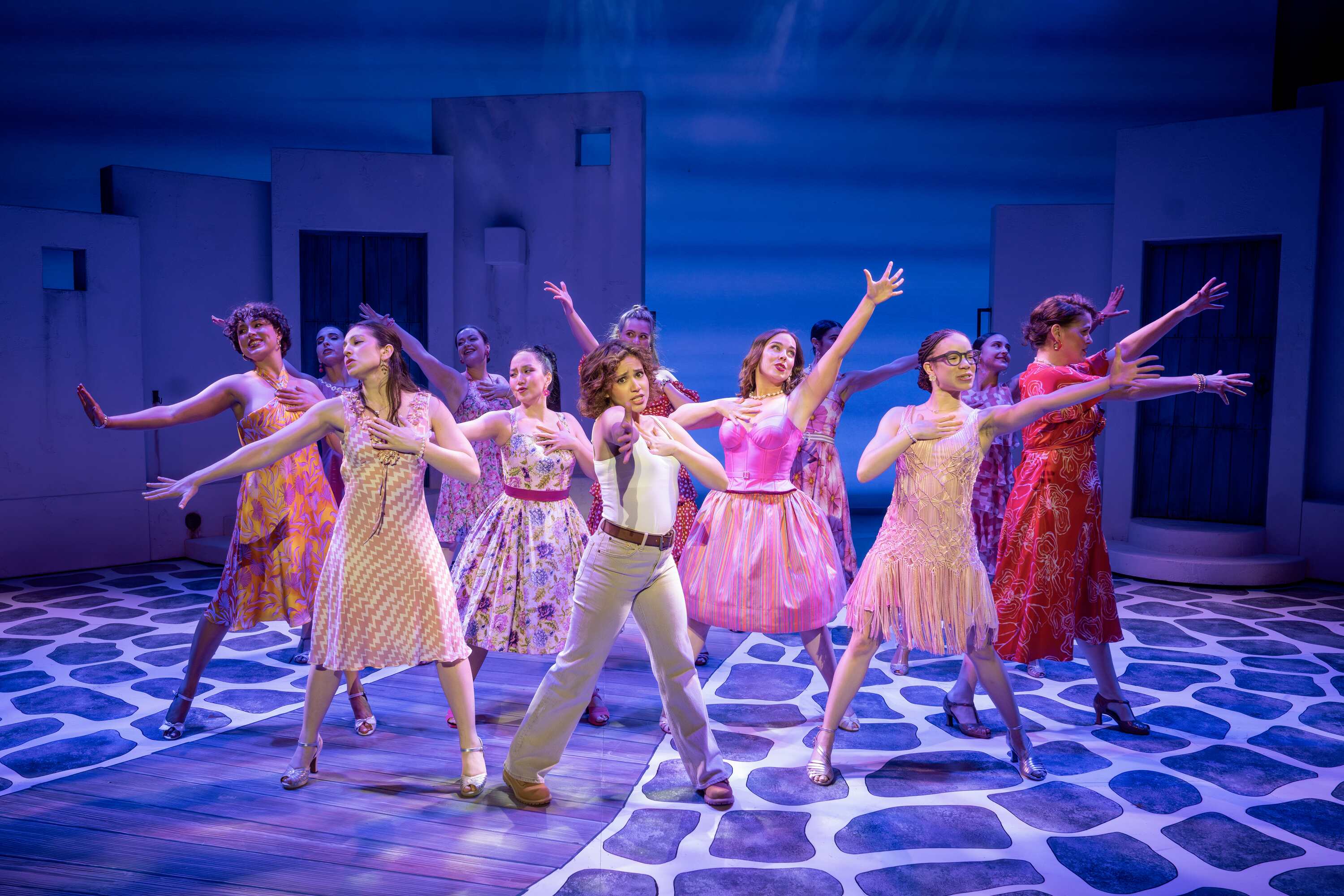 Mamma Mia production photo featuring Juliette M. Ojeda and the company