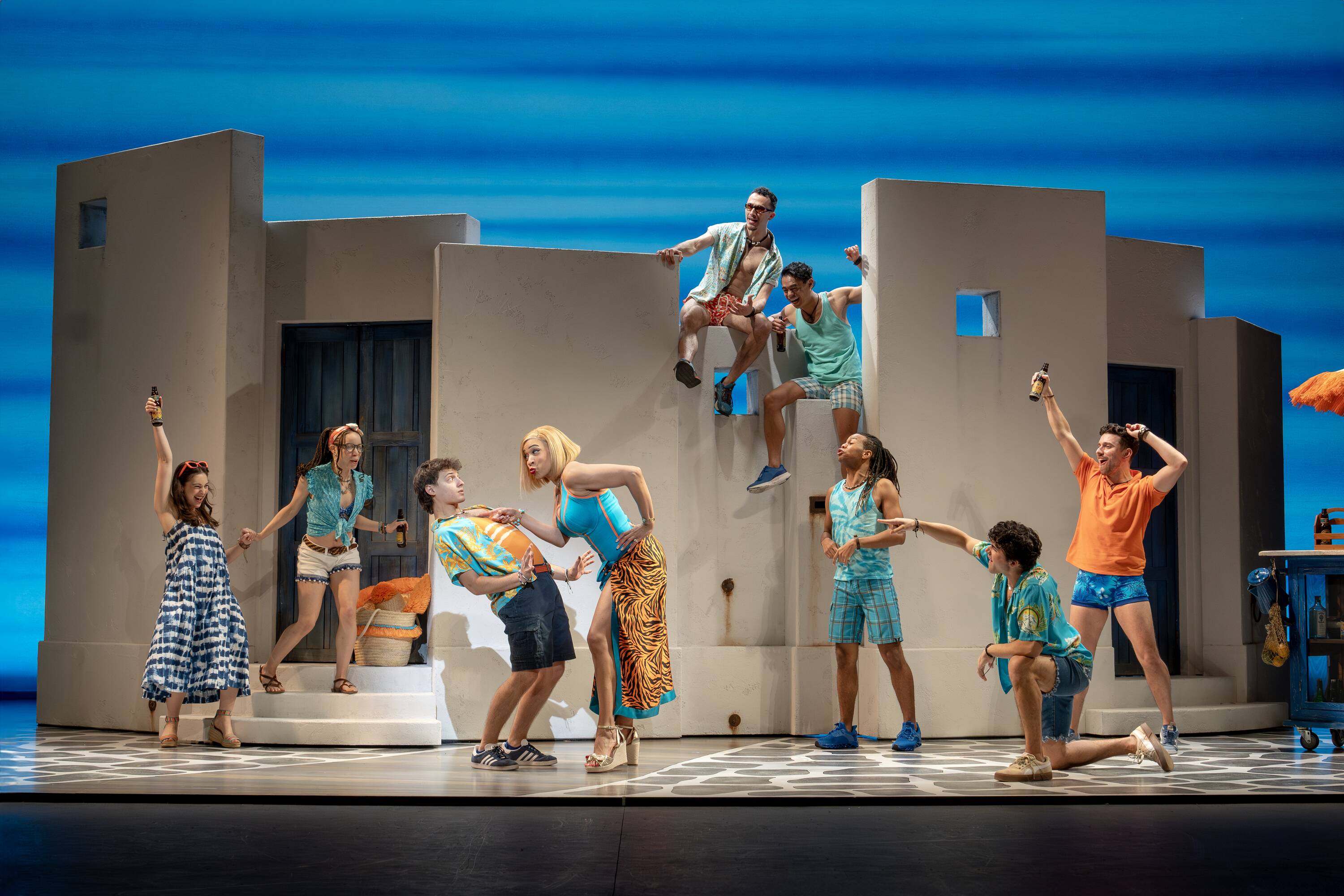 Mamma Mia production photo featuring Dominic Young, Jalynn Steele, and the company
